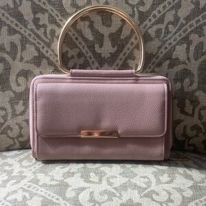 Elegant Pink Handbag with Gold Accents